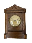 German striking mantle clock in an oak case by the Hamburg and American Clock company