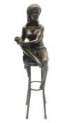 Art Deco style bronze modelled as a female figure seated upon a chair