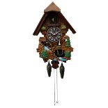 Battery operated cuckoo clock in a traditional chalet styled case with dummy weights