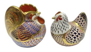 Two Royal Crown Derby paperweights modelled as a cockerel and hen