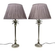 Pair of modern chromed lamps