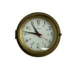 Contemporary quartz timepiece clock in the style of a ship's bulkhead clock