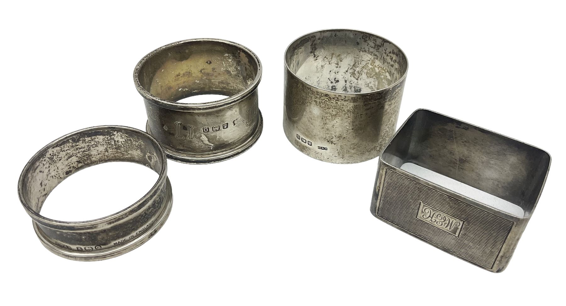 Four silver napkin rings