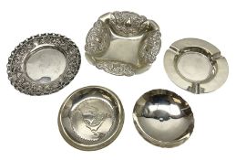 Group of white metal dishes