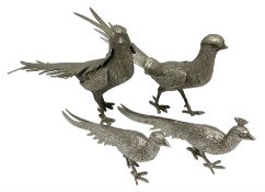 Set of four metal bird figures