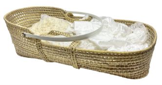 Child's Moses basket and quantity of blankets etc