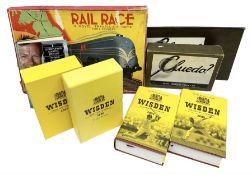 Books on cricket including early 21st century Wisdens; Rail Race board game; and early Waddington's