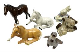 Three Beswick figures of horses