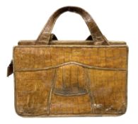 Vintage tan crocodile leather handbag with internal pockets and zip