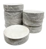 Quantity of plain white dinner plates