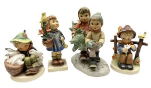 Four Goebel Hummel figures comprising Tree Trimming Time