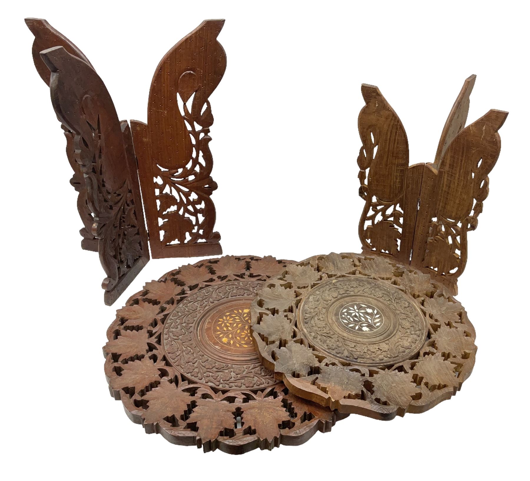 Two Indian carved and inlaid hardwood occasional tables with folding stands