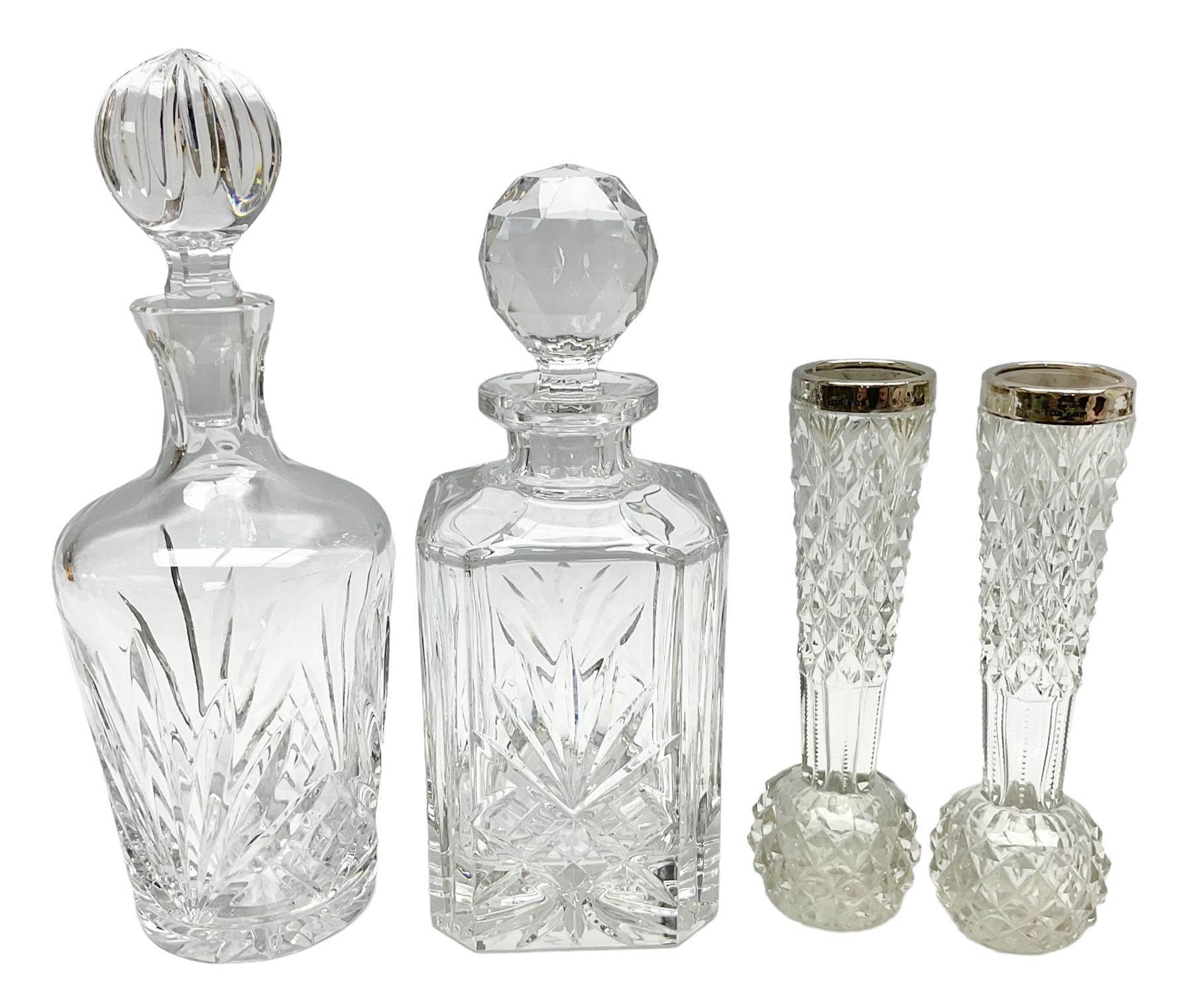 Silver collared cut glass vases