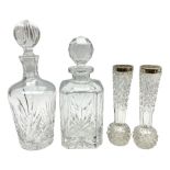 Silver collared cut glass vases