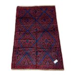 Persian Baluchi blue ground rug