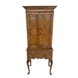 Queen Anne style figured walnut drinks cabinet on stand