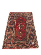 Persian red and blue ground rug