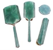 1930's three piece silver mounted and green guilloche enamel dressing table set