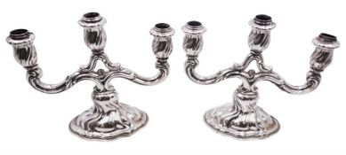 Pair of 20th century German silver three light twin branch candelabra