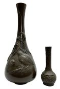 Late 19th/early 20th century Japanese bronze vase of slender baluster form with flared neck