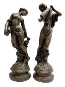 Pair of bronzed figures of water carriers