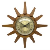 Mid-century teak sunburst wall clock by Anstey & Wilson