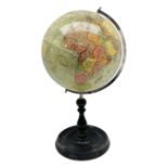 Terrestrial globe set in a wood stand
