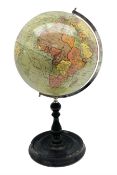 Terrestrial globe set in a wood stand