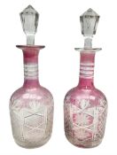 Pair of late 19th/early 20th century cranberry flash cut glass decanters