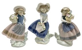 Three Lladro Flower Girls figures