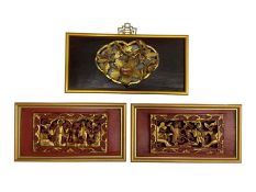 Set of three early 19th century Chinese carved gilt wood panels of rectangular form