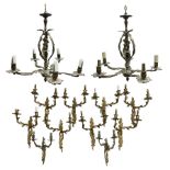 Set of eight Rococo style gilt metal two branch wall sconces