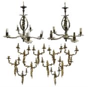 Set of eight Rococo style gilt metal two branch wall sconces