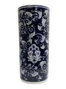 Blue and white umbrella/stick stand decorated with a floral pattern