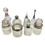 Group of silver mounted glass dressing table jars and bottles