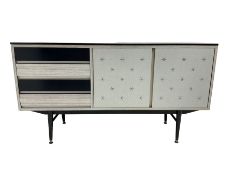 Retro sideboard with star decoration to the cupboard doors