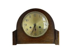 Oak cased mid 20th century 8-day striking mantle clock with pendulum