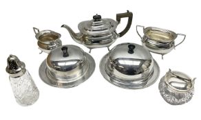 Silver plated three-piece tea set; two muffin dishes; cut-glass sugar caster; and sugar lump bowl wi