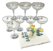 Breweriana; Eight Babycham glasses together with a Babycham plastic fawn mascot and linen I'd Love a