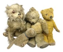 Two teddy bears and two stuffed dogs for restoration