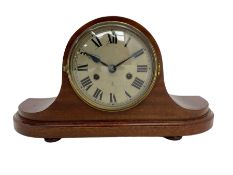 1950s German striking mantle clock in a mahogany case.