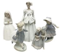 Three Nao figures comprising The Next Dance 1201 and Girls First Communion 0236