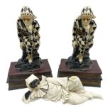 Pair of early-mid 20th century figural composite bookends modelled as harlequin court jesters sat up