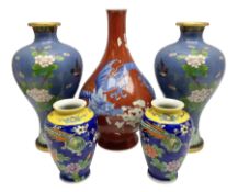 20th Century Japanese vase decorated with a blue dragon and gilding upon red yellow ground