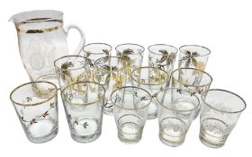 Mid 20th century glass part lemonade set comprisimg jug decorated with white floral sprays and gilt