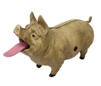 Cast iron mechanical money bank in the form of a pig