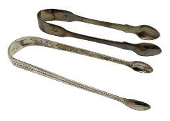 Two pairs of Georgian silver sugar tongs