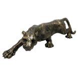 Cast metal figure modelled as a cougar in crouching pose