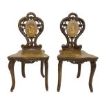 Pair 19th century Black Forest type inlaid hall chairs