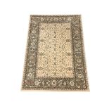 Persian design pale ground rug